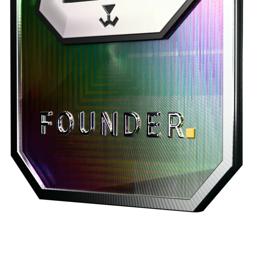 A close view of the Founder tag: the frosted relief of Silver’s face, black enamel lines, and the holographic grating of the face catching the light.